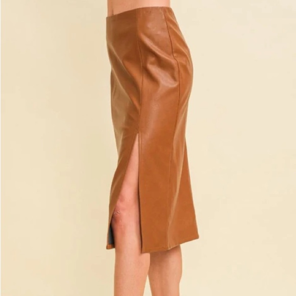 A camel faux leather midi skirt with a stylish slit